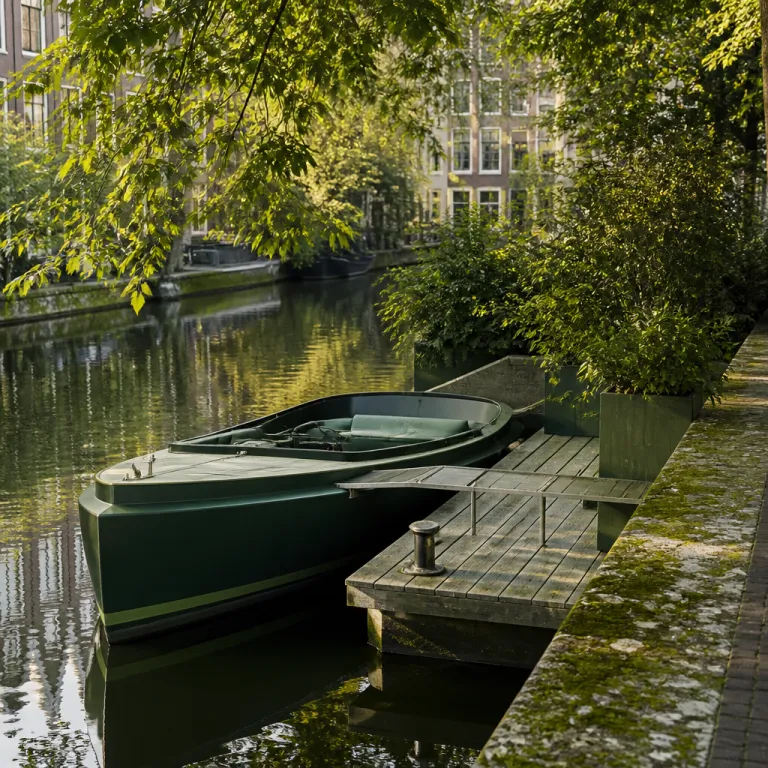 The Electric Canal Boat and the Hotel Dock: How Amsterdam Properties Rethink Water Access