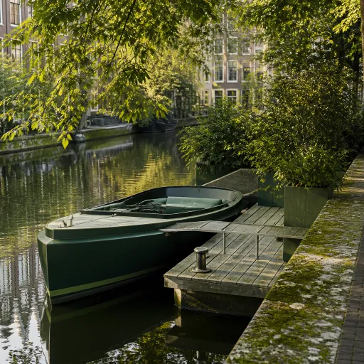 The Electric Canal Boat and the Hotel Dock: How Amsterdam Properties Rethink Water Access